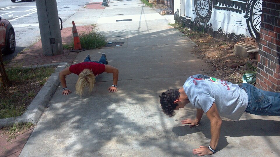 Pushups outside restuarant Push Up Challenge Obstacle Race Training